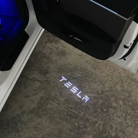 Tesla logo projection lights